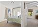 Bedroom with a double bed and access to another room at 935 Don Wilson Ave, Apopka, FL 32712