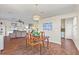 Open dining room with view into living room at 935 Don Wilson Ave, Apopka, FL 32712
