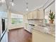 Modern kitchen with granite countertops and stainless steel appliances at 935 Don Wilson Ave, Apopka, FL 32712