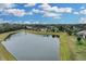 Stunning view of a tranquil lake from this beautiful home at 11013 Creighton Dr, Orlando, FL 32817