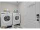 Laundry room with Samsung washer and dryer at 11013 Creighton Dr, Orlando, FL 32817