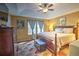 Spacious Primary bedroom with king-size bed and dresser at 1102 Victoria Glen Dr, Sanford, FL 32773