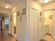 Hallway with access to bedrooms and laundry area at 1102 Victoria Glen Dr, Sanford, FL 32773