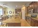 Kitchen with dark brown cabinets, granite countertops, and stainless steel appliances at 1102 Victoria Glen Dr, Sanford, FL 32773