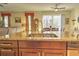 Kitchen island sink with granite countertop and modern faucet at 1102 Victoria Glen Dr, Sanford, FL 32773