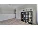 Versatile loft area with a bookcase and beanbag chair at 1218 Limbali St, Mount Dora, FL 32757