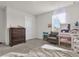 Bedroom with vanity and armchair at 14031 Willow Grace, Orlando, FL 32824