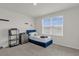 Well-lit bedroom with twin-size bed and shelving at 14031 Willow Grace, Orlando, FL 32824