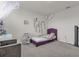 Bedroom with purple platform bed at 14031 Willow Grace, Orlando, FL 32824