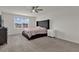 Bright bedroom with a king-size bed and plenty of natural light at 14031 Willow Grace, Orlando, FL 32824