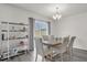 Dining room with wooden table and six chairs at 14031 Willow Grace, Orlando, FL 32824