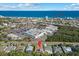 Aerial view showing home's location near beach and amenities at 1406 Saxon Dr, New Smyrna Beach, FL 32169