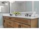 Modern bathroom with double vanity and updated fixtures at 1406 Saxon Dr, New Smyrna Beach, FL 32169