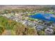 Aerial view of a neighborhood with a lake at 1763 Stargazer Ter, Sanford, FL 32771