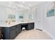 Bathroom with double vanity, dark cabinets and tile floor at 1763 Stargazer Ter, Sanford, FL 32771