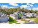 Two-story house with grey exterior and palm trees at 1763 Stargazer Ter, Sanford, FL 32771