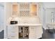 White kitchen with wine cooler and built-in microwave at 1763 Stargazer Ter, Sanford, FL 32771