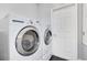 Laundry room with LG washer and dryer, and a white door at 1763 Stargazer Ter, Sanford, FL 32771