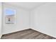 Bright and airy bedroom with luxury vinyl plank flooring and a large window at 1864 Maple Plum Ct, Sanford, FL 32771