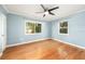 Spacious bedroom with hardwood floors and large windows at 1937 Eland Ave, Winter Park, FL 32789