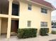 Building exterior, featuring entrance to unit 211 at 211 W San Sebastian Ct, Altamonte Springs, FL 32714