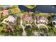 Luxury home community with lakefront properties and lush landscaping at 2224 Alaqua Dr, Longwood, FL 32779