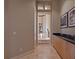 Bright hallway with built-in cabinetry and views to living area at 2224 Alaqua Dr, Longwood, FL 32779