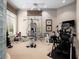 Well-equipped home gym with various exercise machines at 2224 Alaqua Dr, Longwood, FL 32779