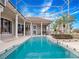 Inviting screened pool with a large patio area at 2224 Alaqua Dr, Longwood, FL 32779