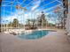 Relaxing screened pool with spa and tranquil lake views at 2224 Alaqua Dr, Longwood, FL 32779