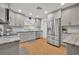 Updated kitchen featuring stainless steel appliances and light gray cabinets at 2231 Deloraine Trl, Maitland, FL 32751