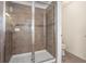 Modern bathroom with a large walk-in shower and tile flooring at 250 Merry Brook Cir, Sanford, FL 32771