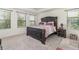 Spacious bedroom with king-size bed and plenty of natural light at 250 Merry Brook Cir, Sanford, FL 32771