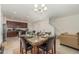 Bright dining area with seating for six and kitchen views at 250 Merry Brook Cir, Sanford, FL 32771