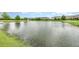 Serene community lake with lush green surroundings at 250 Merry Brook Cir, Sanford, FL 32771