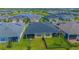 Community view, featuring a lake and multiple houses at 2555 Yellow Brick Rd, St Cloud, FL 34772