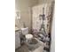 Clean bathroom with a shower/tub and decorative shower curtain at 2624 Robert Trent Jones Dr # 615, Orlando, FL 32835