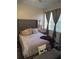 Elegant Primary bedroom with a plush bed and decorative pillows at 2624 Robert Trent Jones Dr # 615, Orlando, FL 32835