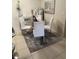 Small dining area with glass table and rug at 2624 Robert Trent Jones Dr # 615, Orlando, FL 32835