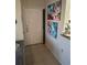 Bright entryway with tile floor and art at 2624 Robert Trent Jones Dr # 615, Orlando, FL 32835