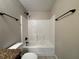 Bathroom with tub shower, vanity, and toilet at 2650 Sw 162Nd Ln, Ocala, FL 34473