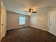 Main bedroom with ceiling fan and neutral colored walls at 2650 Sw 162Nd Ln, Ocala, FL 34473