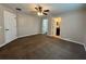 Large main bedroom with ceiling fan and access to bathroom at 2650 Sw 162Nd Ln, Ocala, FL 34473