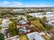 Aerial shot of the home showcasing the pool, solar panels, and the surrounding neighborhood at 2717 Rose Moss Ln, Orlando, FL 32807