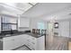 Bright kitchen featuring modern appliances, granite countertops, and an island with bar seating at 2717 Rose Moss Ln, Orlando, FL 32807