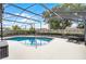 Covered pool and patio area offers a great space to relax and entertain guests at 2717 Rose Moss Ln, Orlando, FL 32807