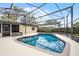 Inviting screened-in pool area with a well-maintained deck and clear blue water at 2717 Rose Moss Ln, Orlando, FL 32807