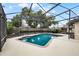 Spacious screened-in pool area, perfect for cooling off on hot summer days at 2717 Rose Moss Ln, Orlando, FL 32807