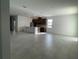 Expansive living space with an open-concept layout and ample natural light at 27469 Black Kite Ave, Howey In The Hills, FL 34737