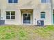 Ground level patio with sliding glass doors at 3196 Crown Jewel Ct, Winter Park, FL 32792